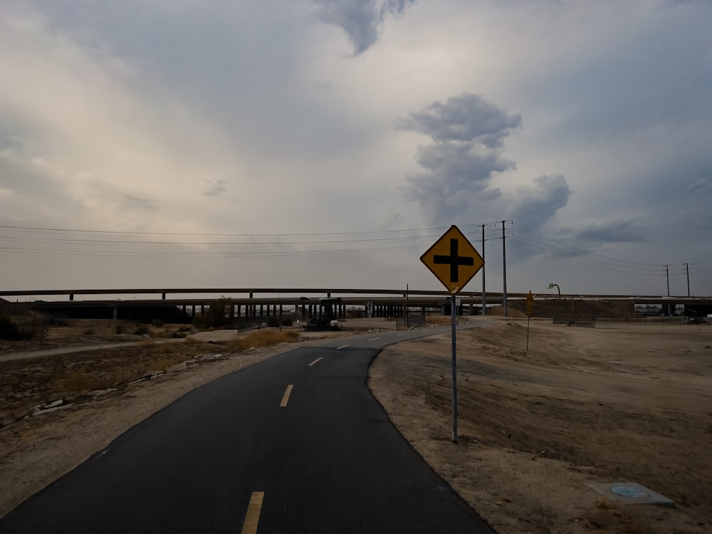 a road sign on the side of a road