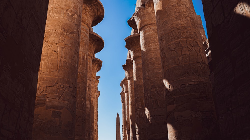 a group of tall stone structures