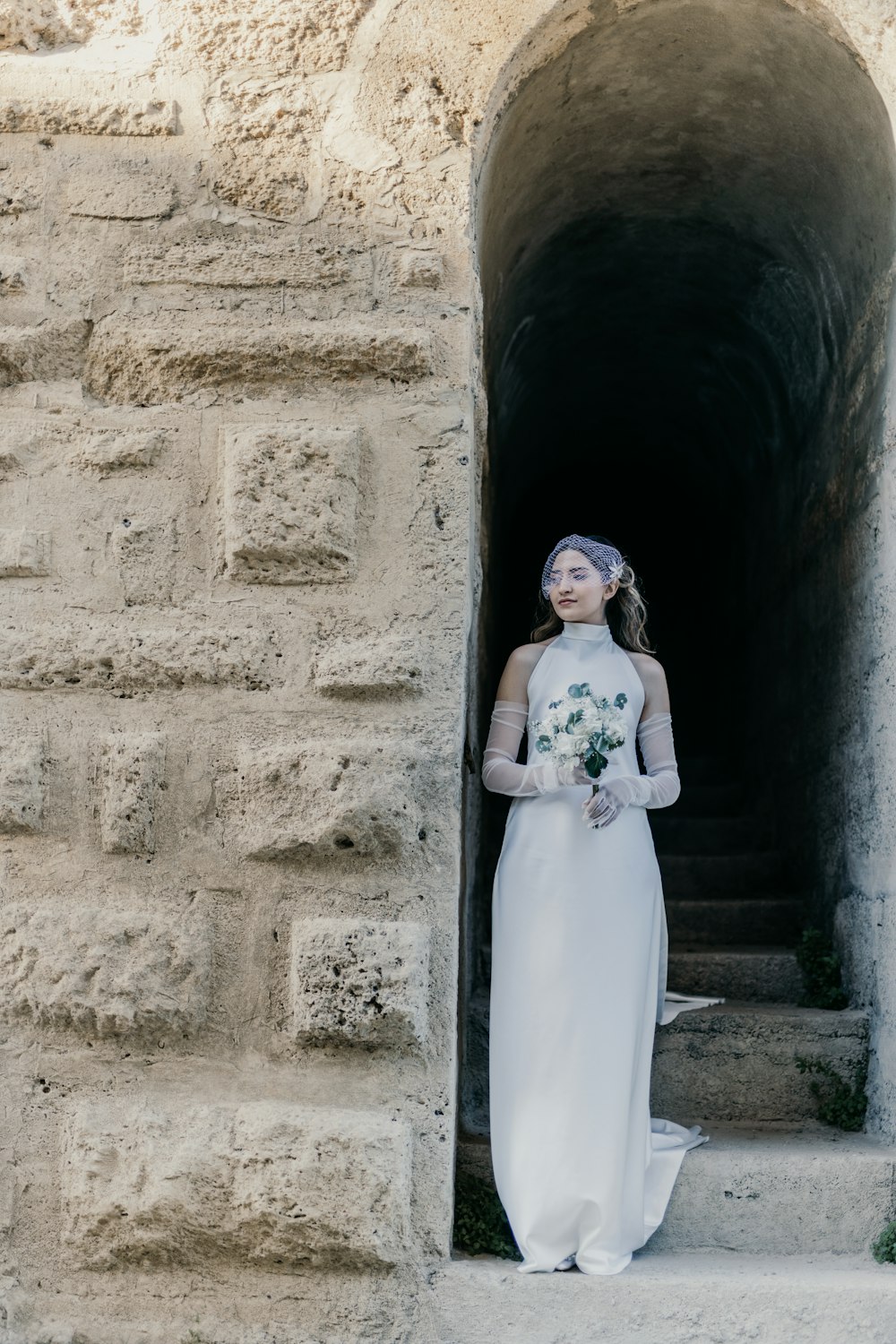 a man in a white dress