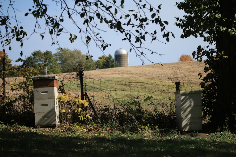 a fenced in yard with a metal gate and a metal gate