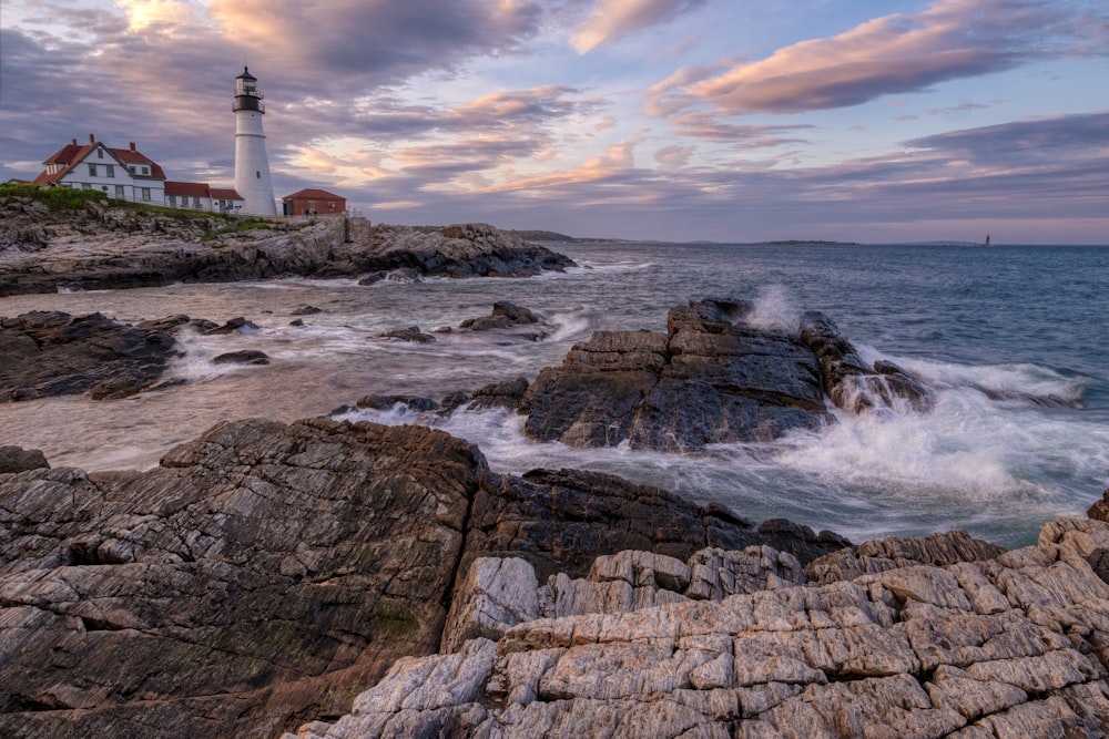 a lighthouse on a rocky shore