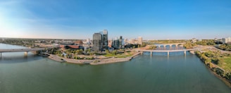 a body of water with a city in the background