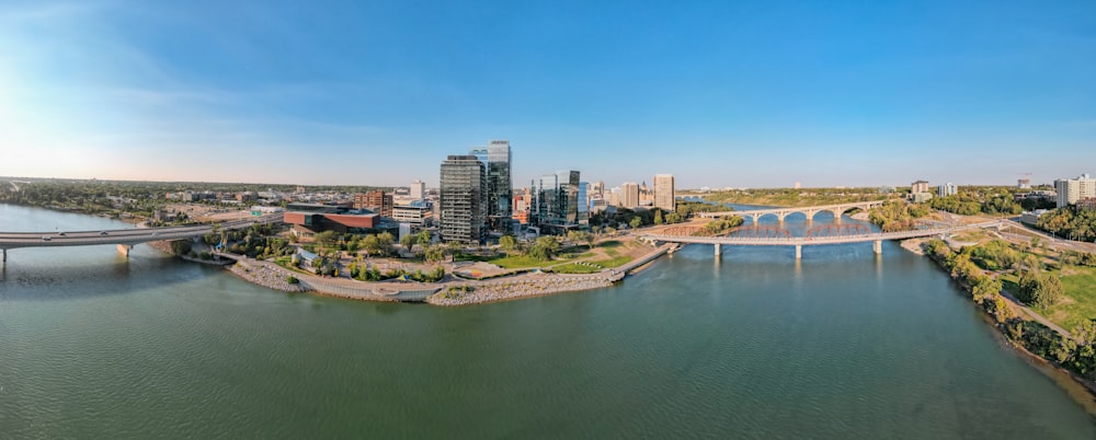 a body of water with a city in the background