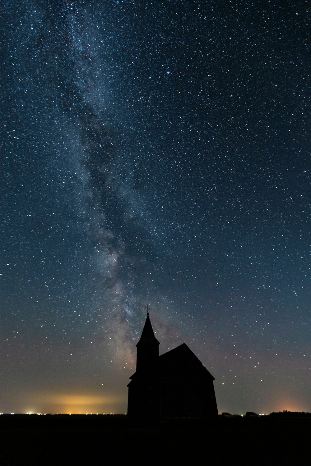 a building with a starry sky above it