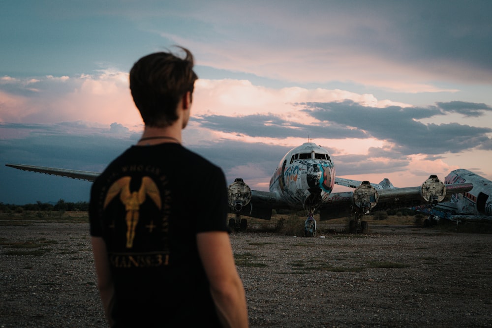 a person looking at a plane