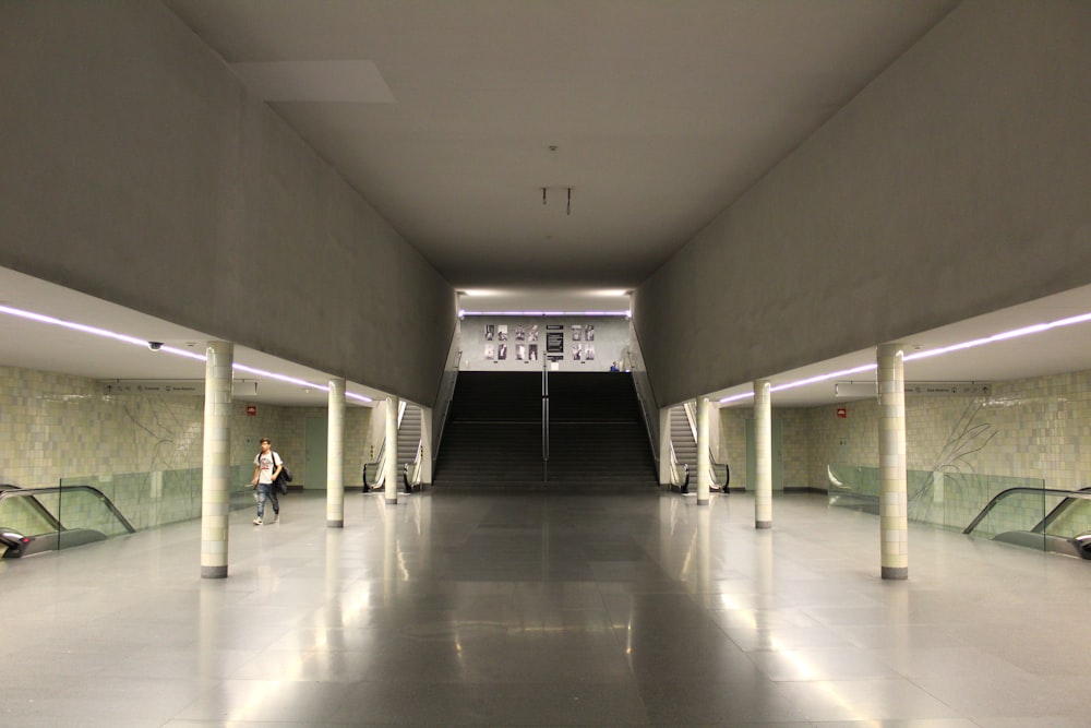 a person walking down a hall