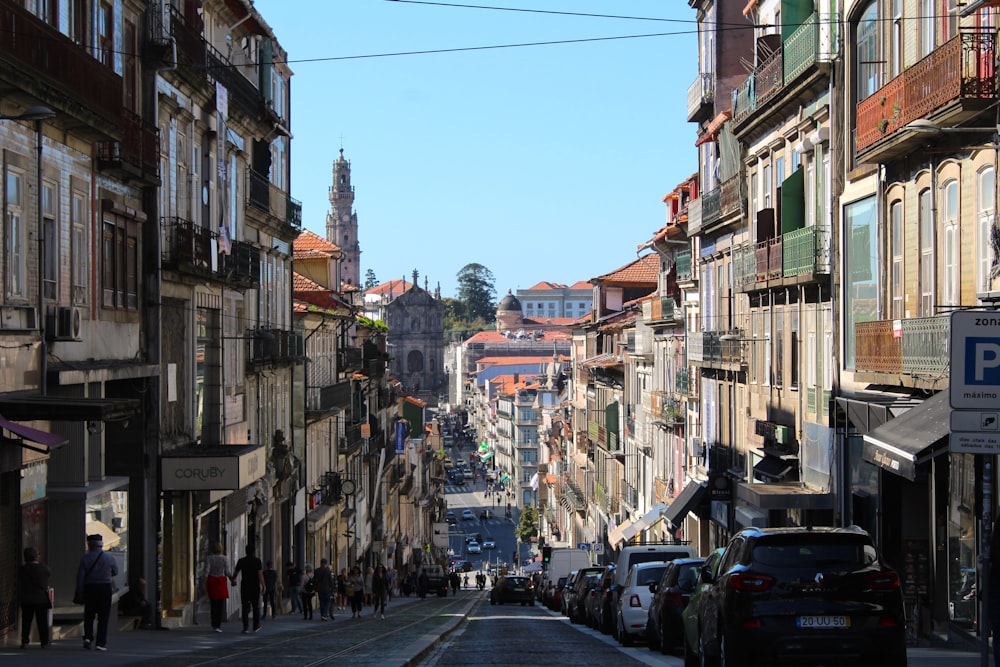 a busy street with cars and people