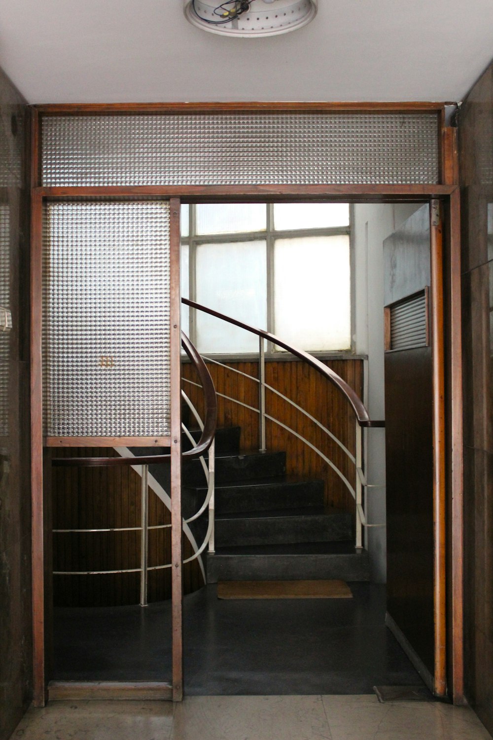a staircase leading to a window