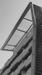 a tall building with a curved roof