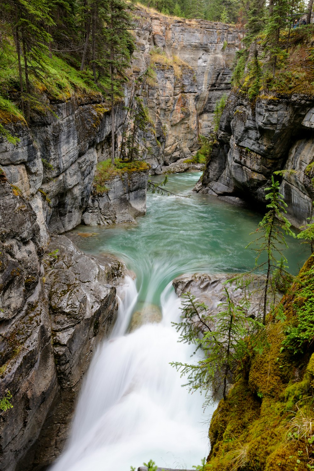 a waterfall in a rocky area