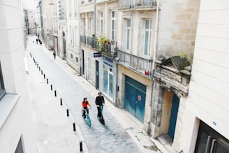 people walking down a street
