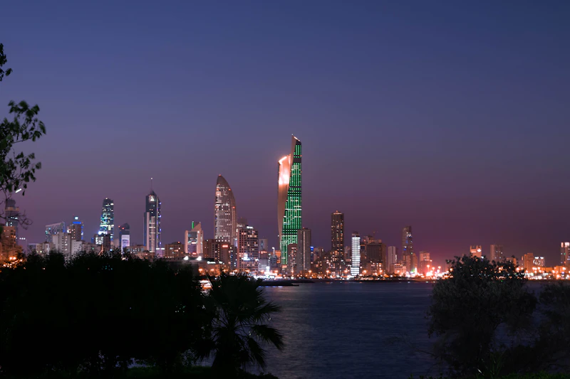 Kuwait City skyline illuminated at night