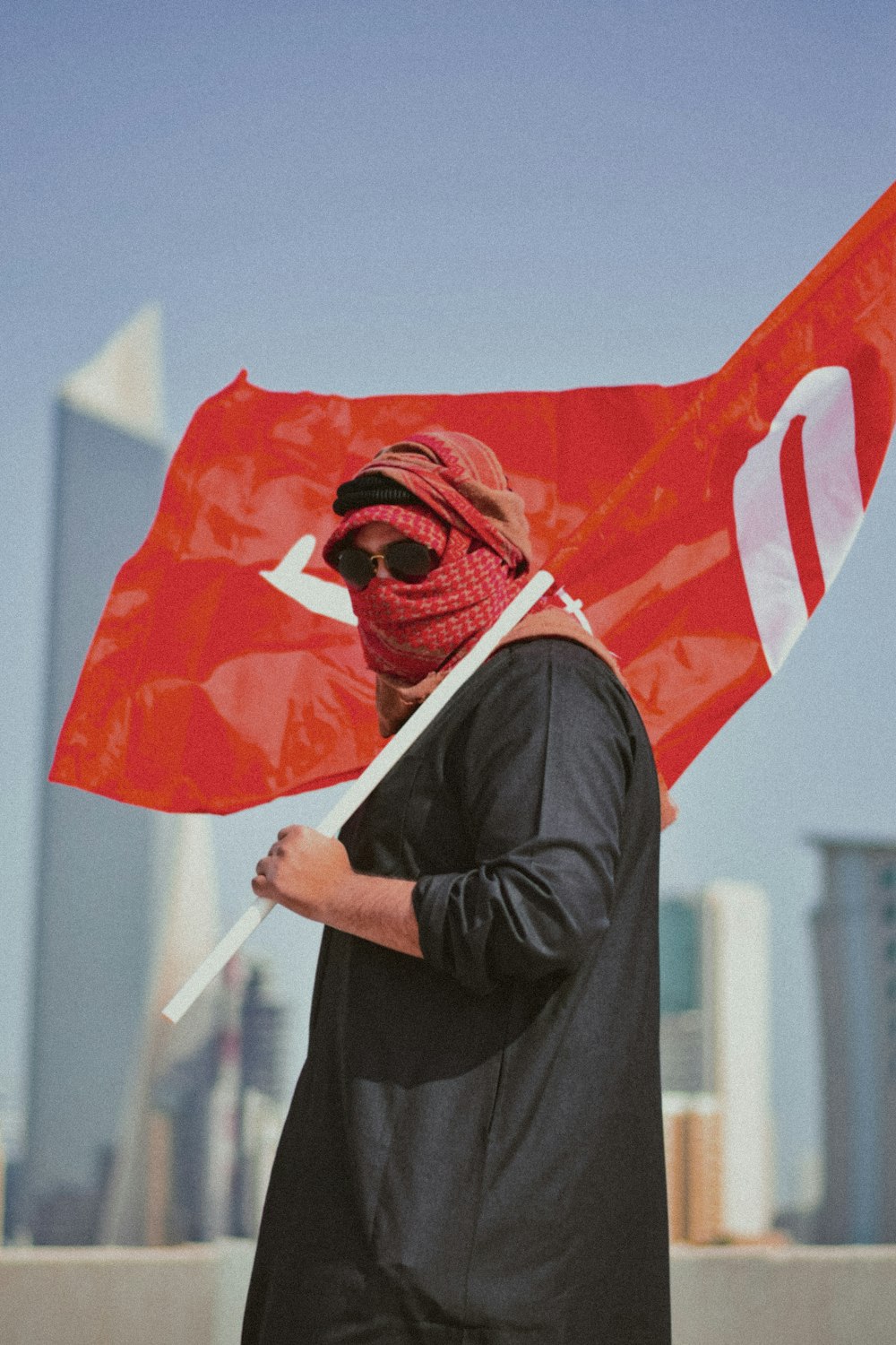 a man holding a flag