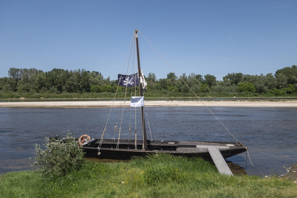 a boat is tied to a dock