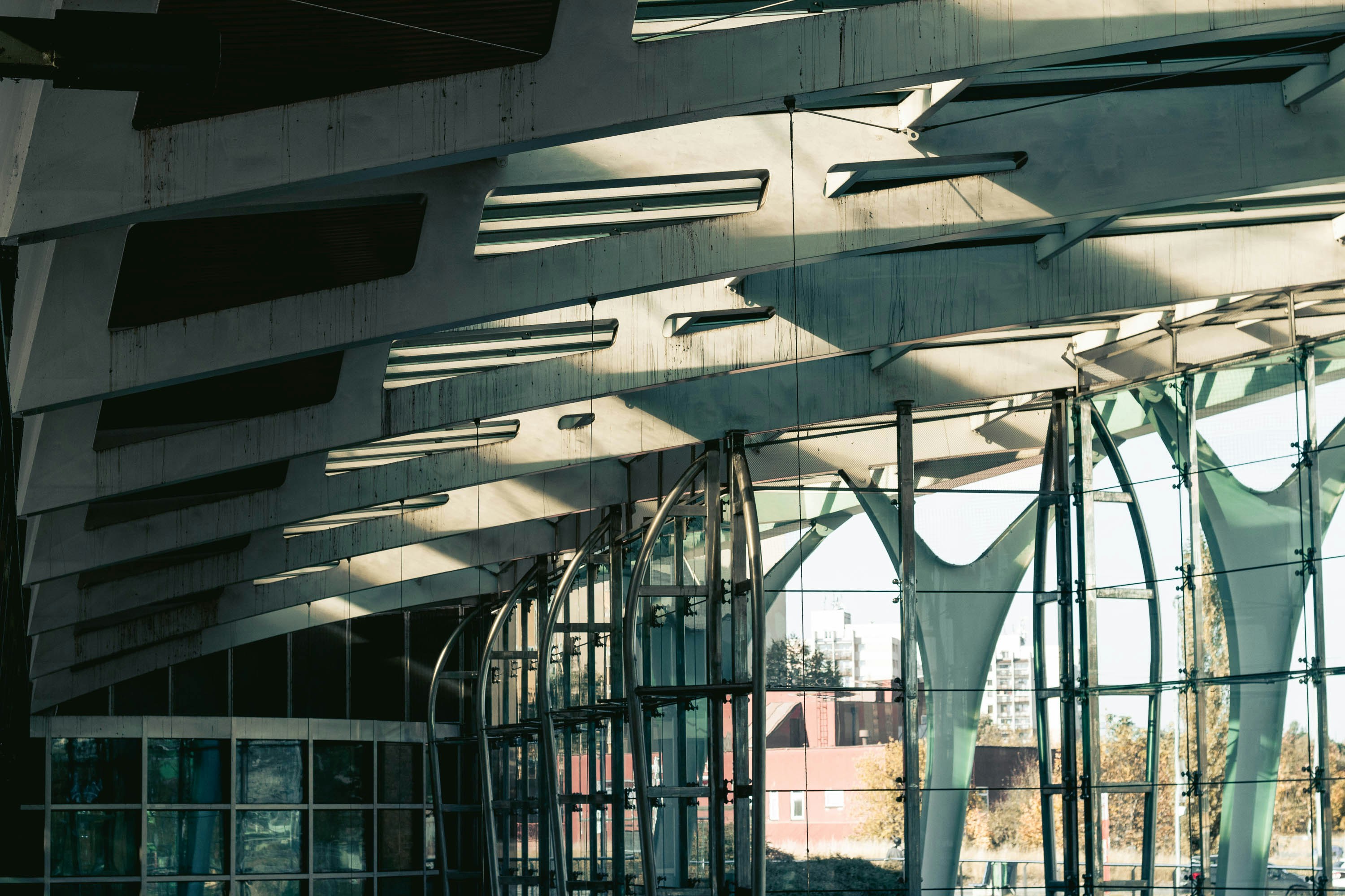 a room with windows and a ceiling with a group of planes