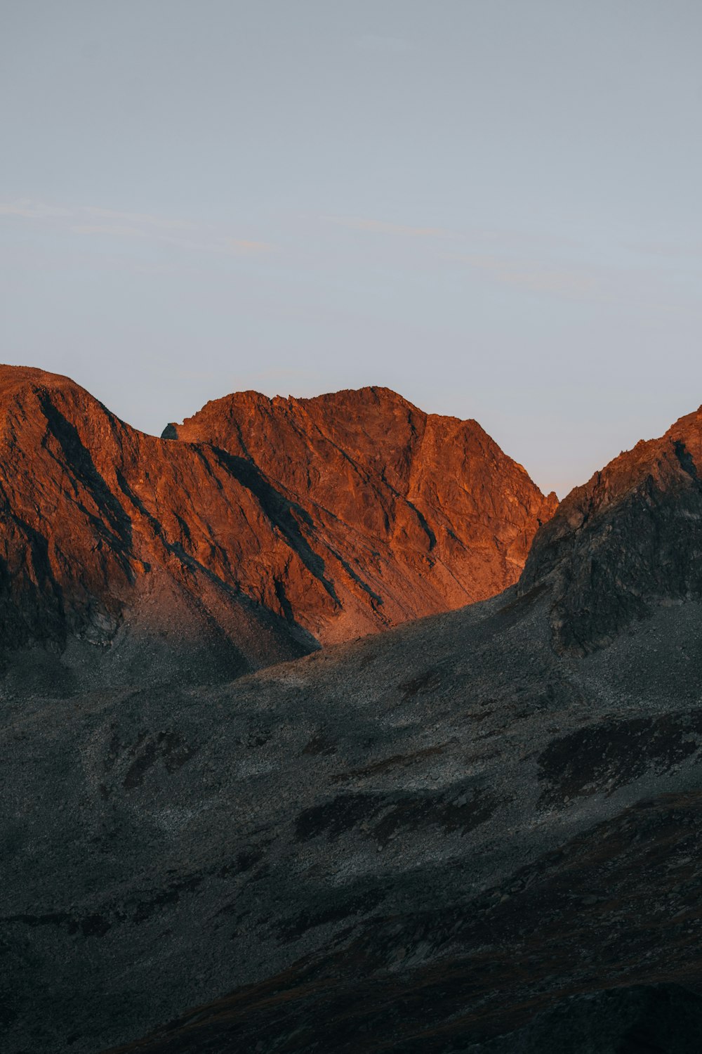 a large mountain in the background