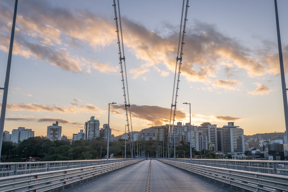 a bridge with a city in the background