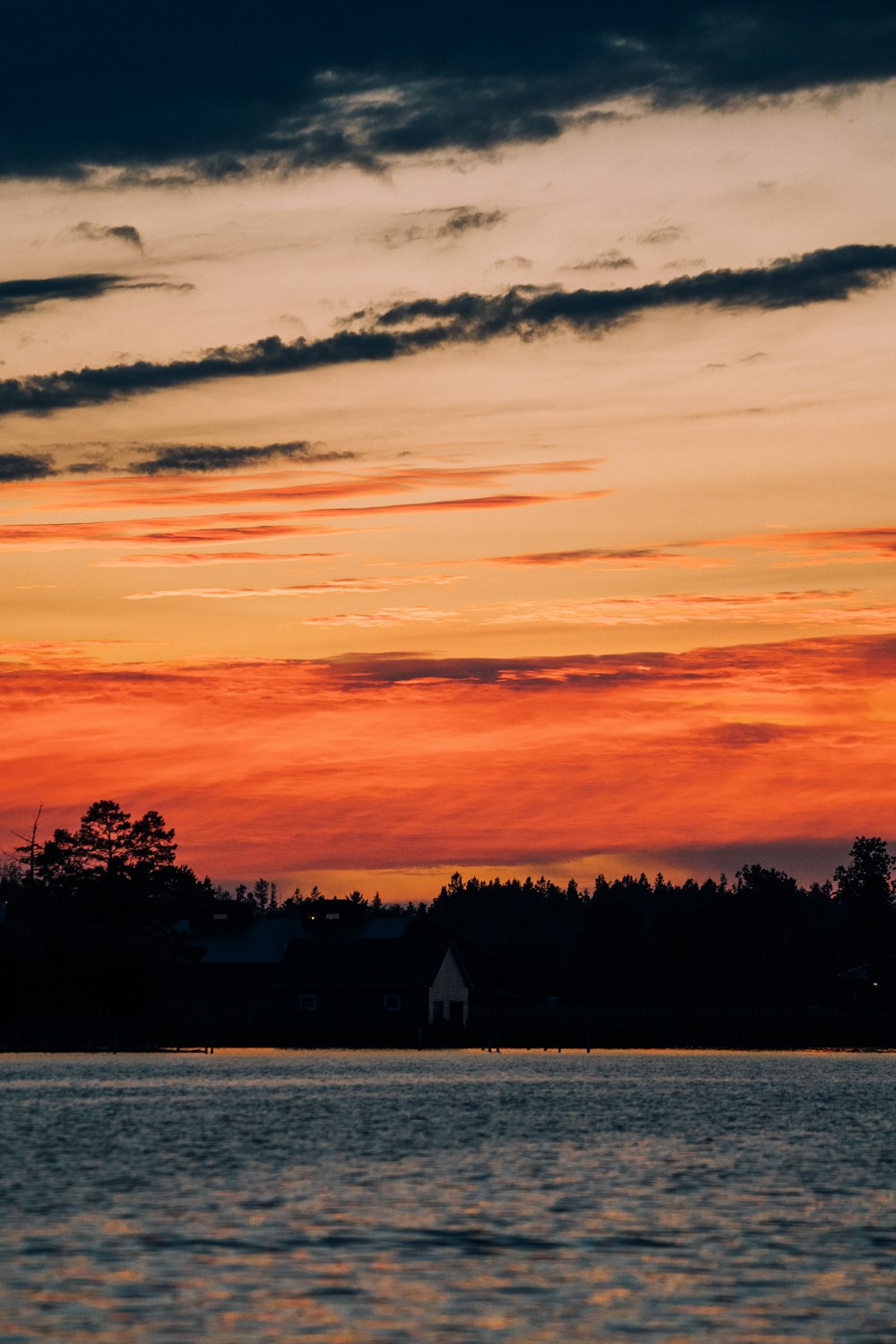 a sunset over a lake