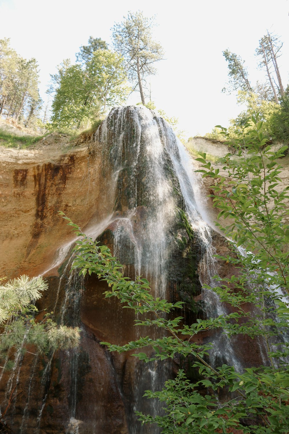 a waterfall over a cliff