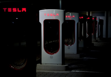 a row of doors with windows: Tesla