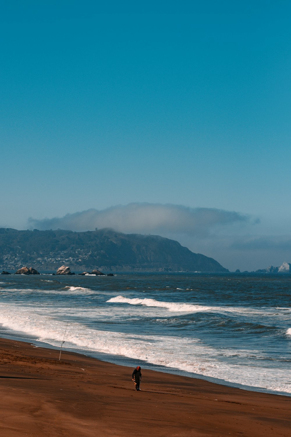 a person standing on a beach