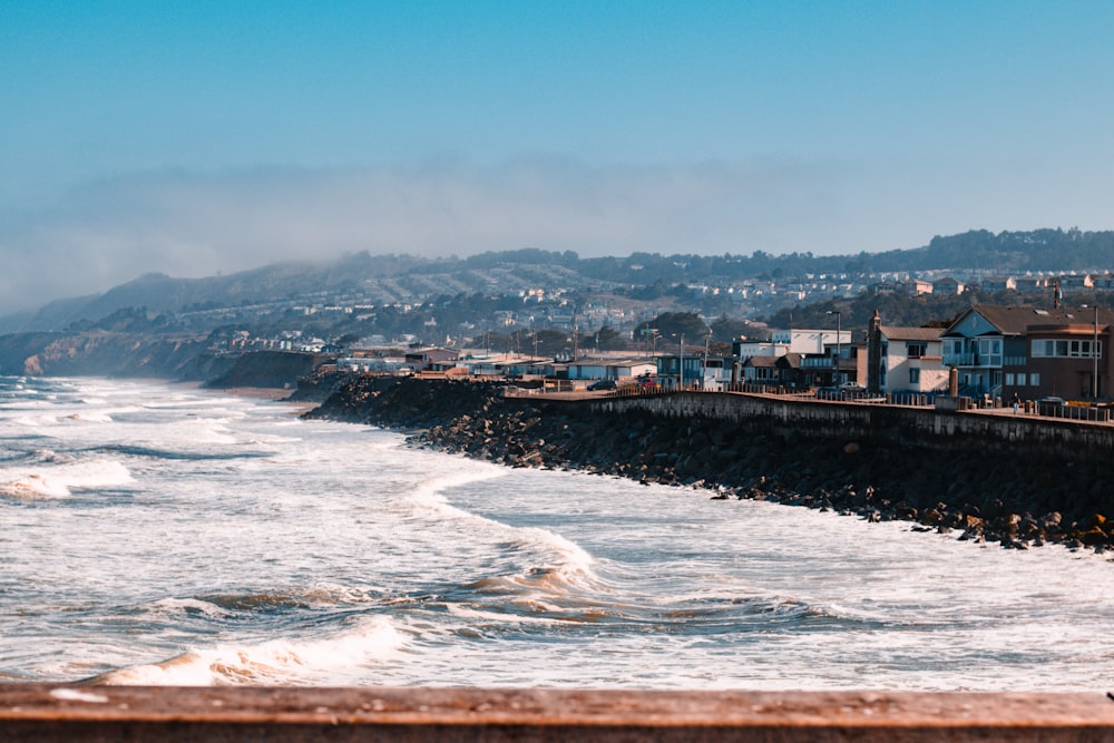 a body of water with buildings along it