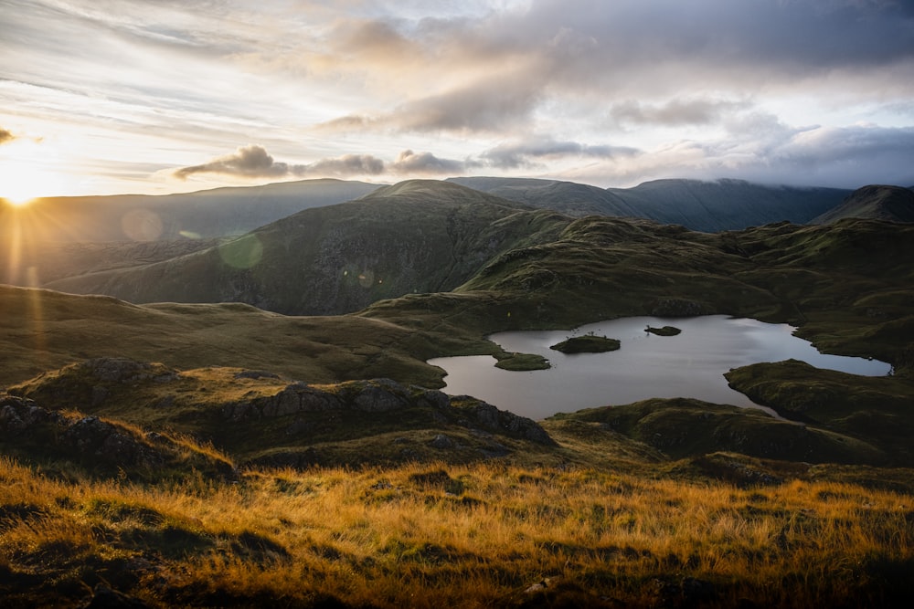 a lake surrounded by hills