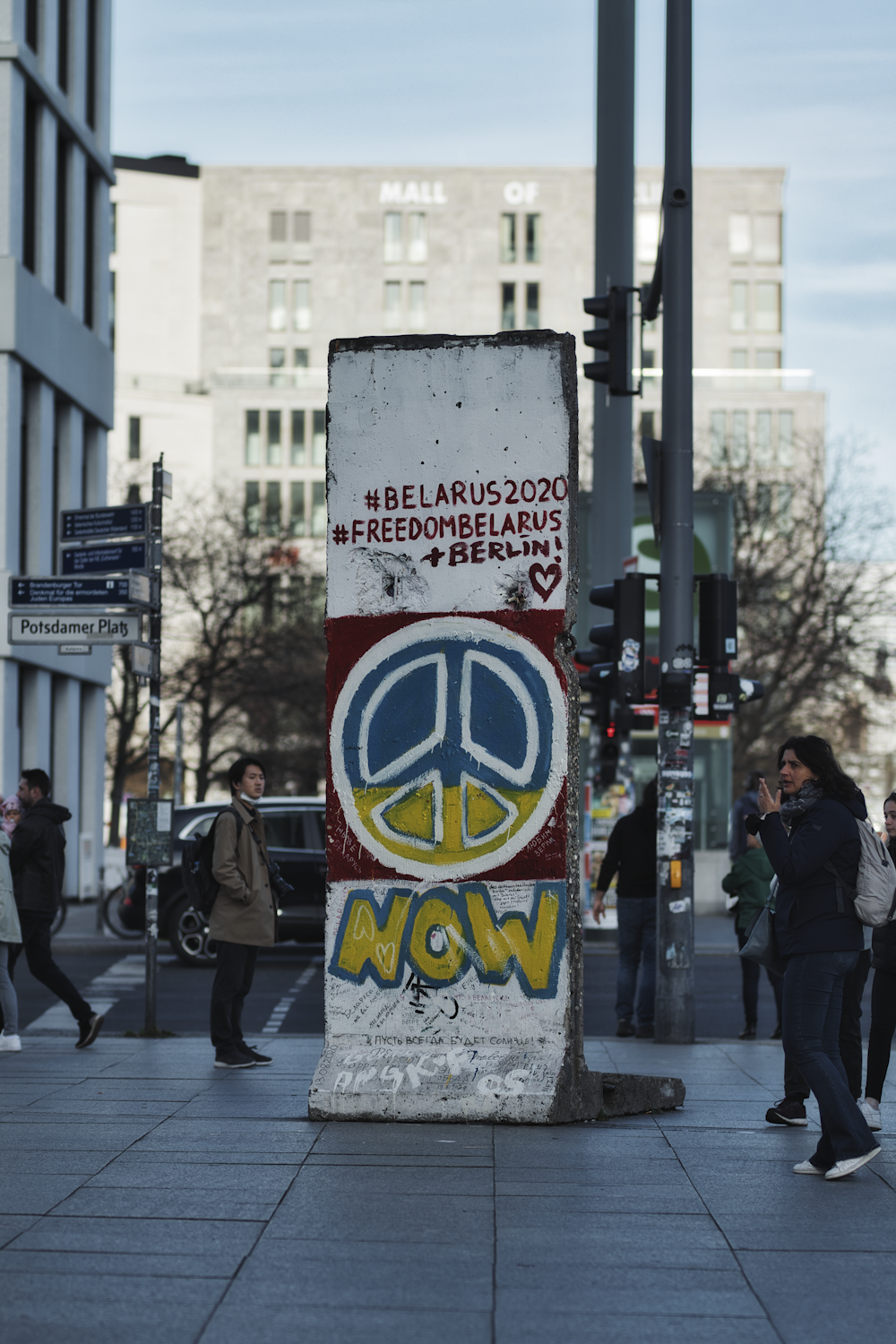 a sign on the sidewalk