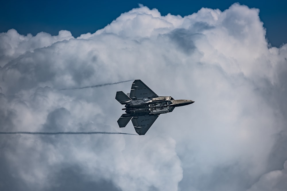 a fighter jet flying through the air