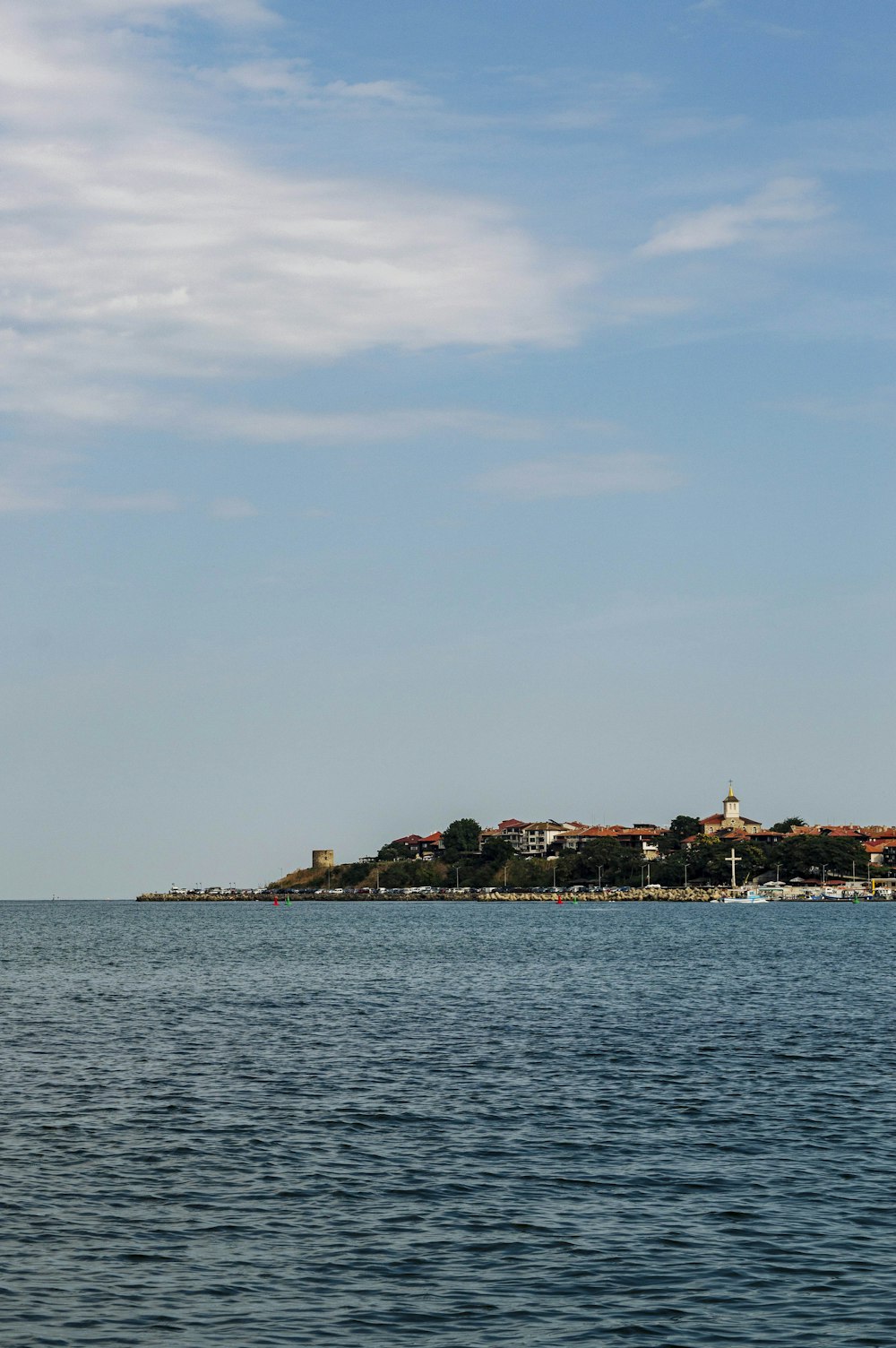 a body of water with buildings along it