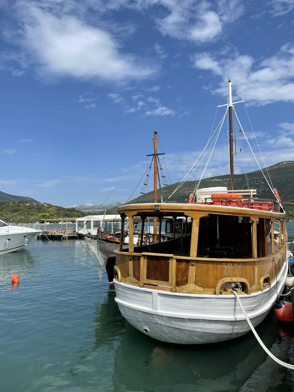 a boat docked at a pier