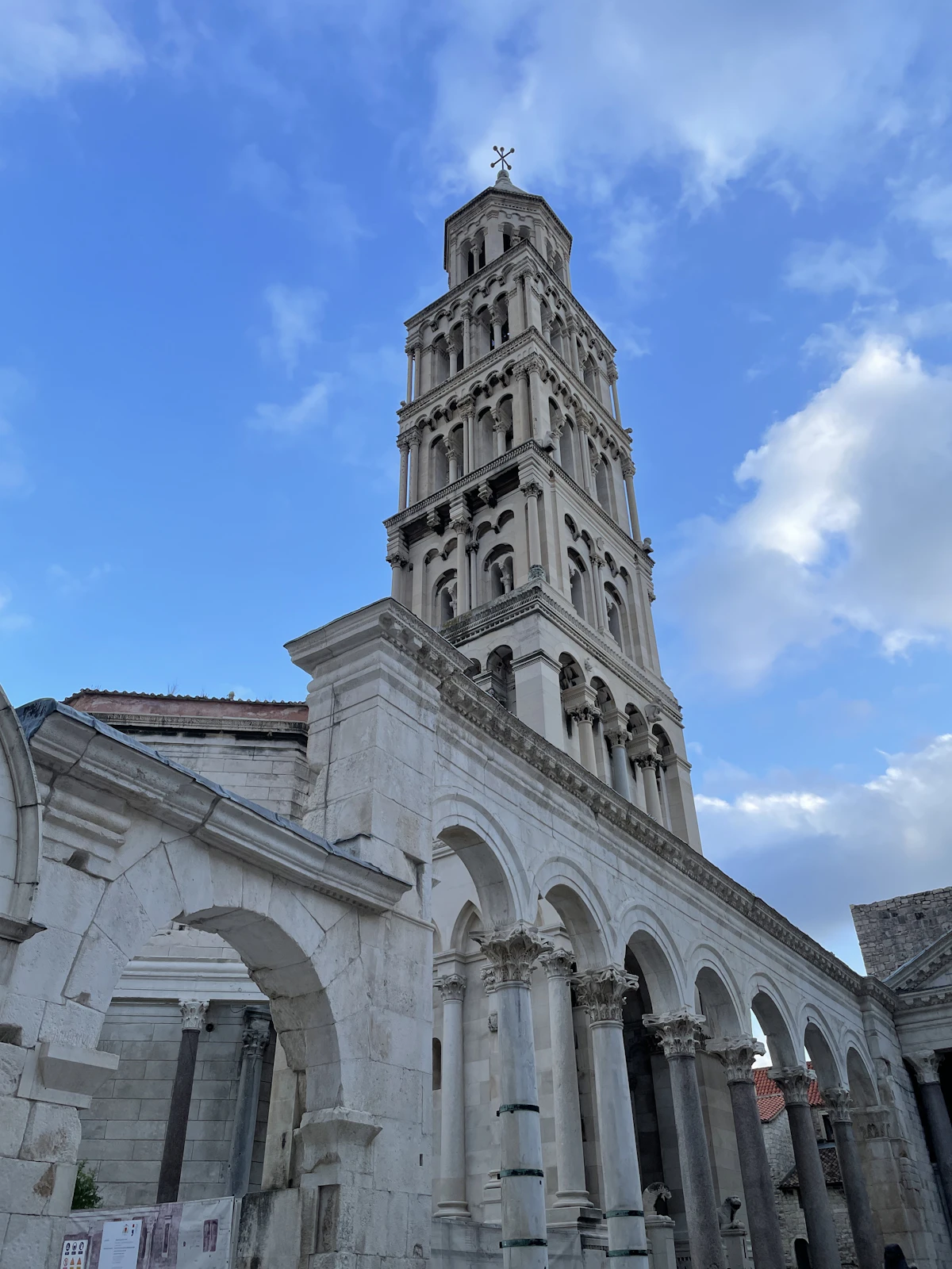 Stone arches and bell tower at Diocletian's Palace in Split