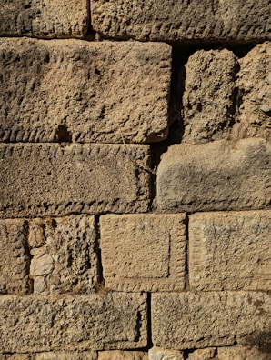 Close-up of precise stone joints in a South American megalithic wall, showcasing ancient craftsmanship.