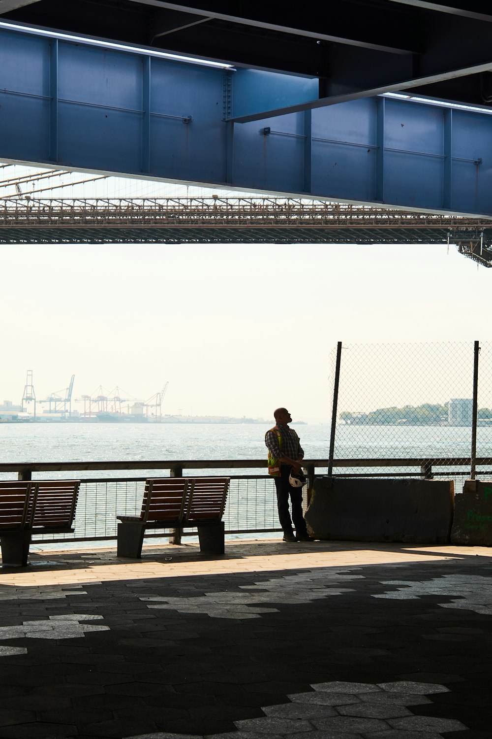 a person standing on a sidewalk