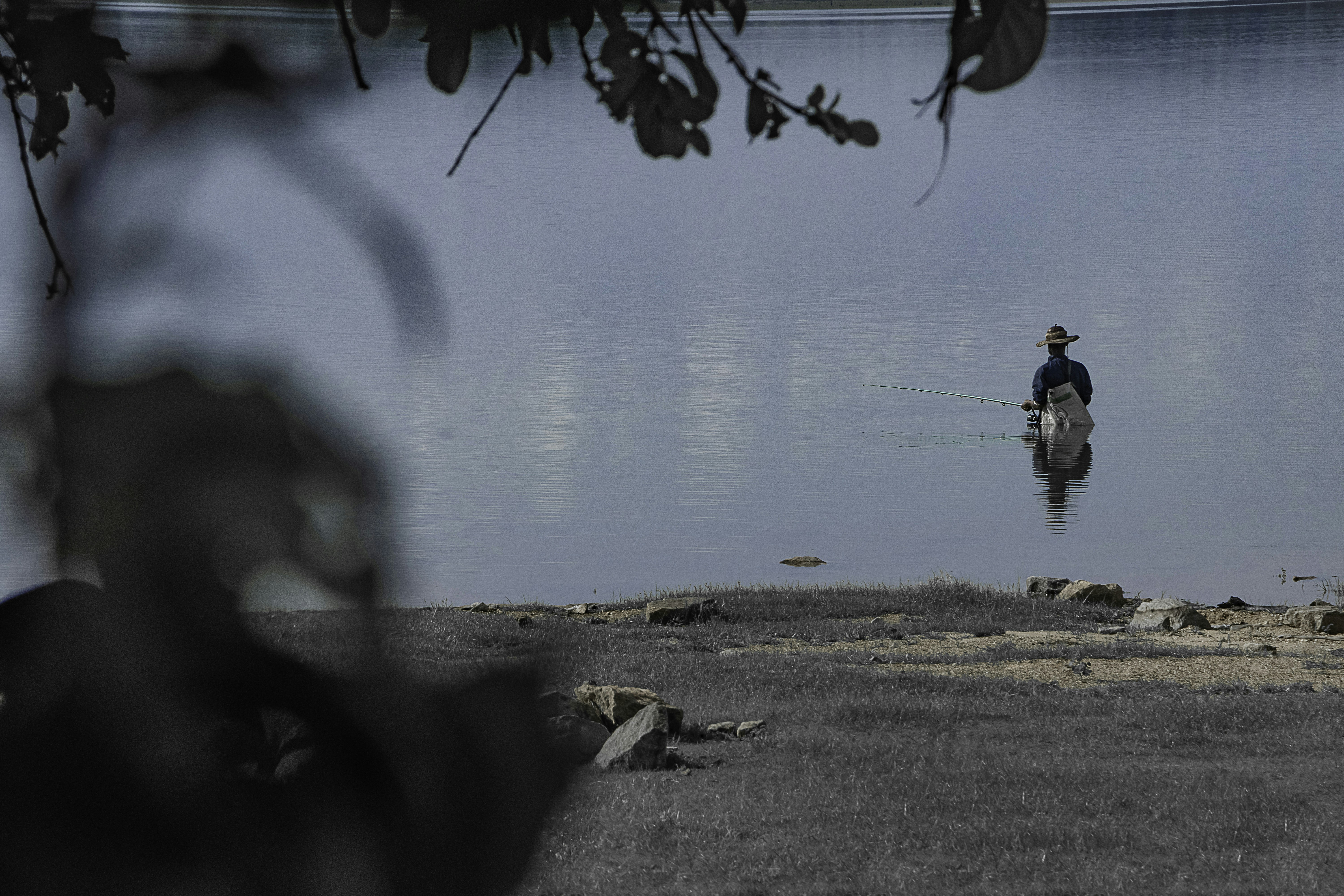 a person riding a bicycle on a beach