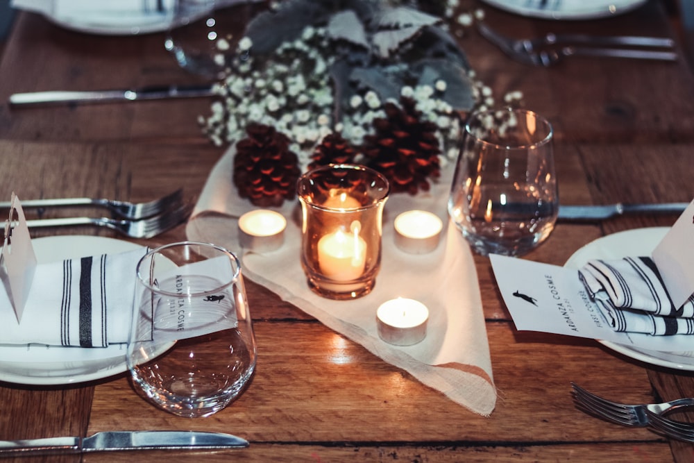 a table with plates and glasses