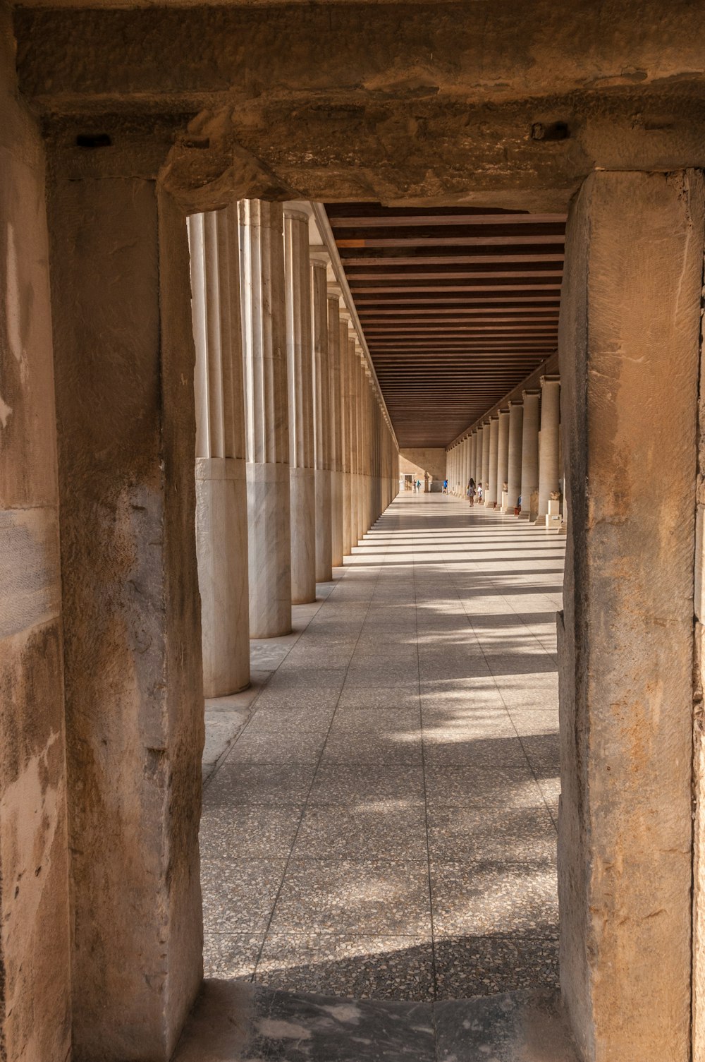 a hallway with columns