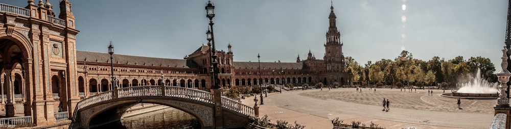 a large building with a fountain in front of it