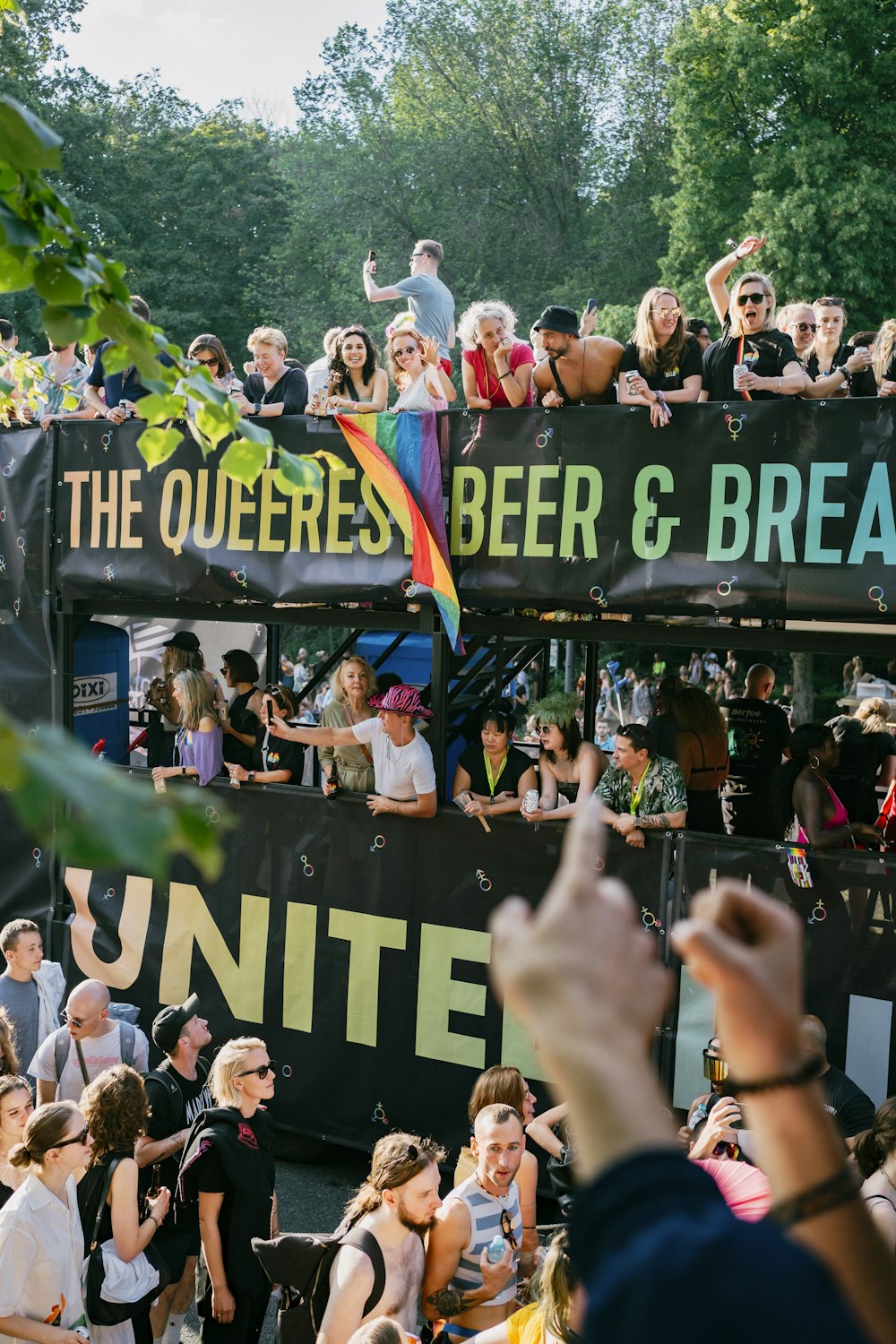 a group of people holding a sign