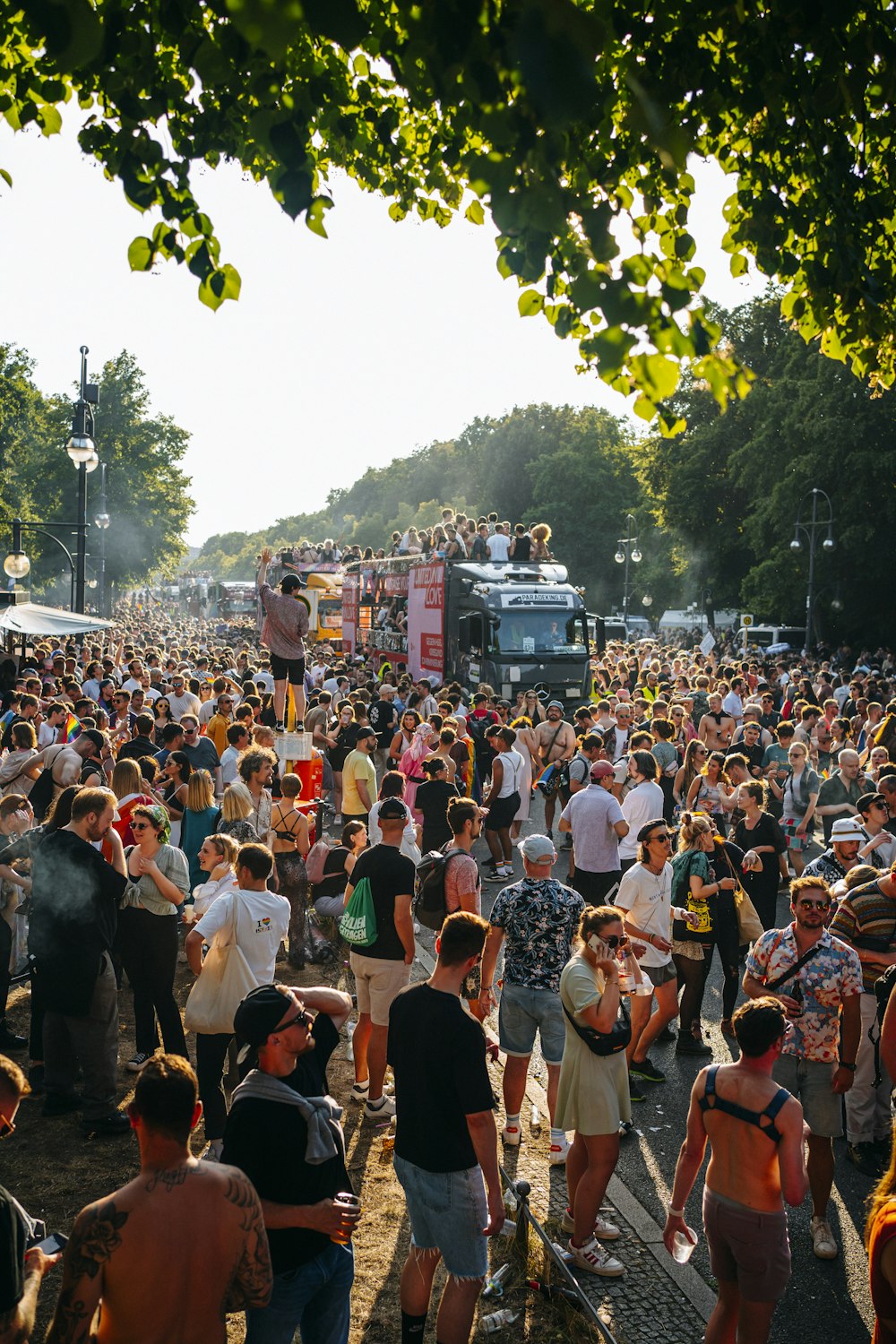 a large crowd of people watching a band play on stage