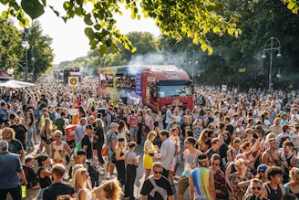 a large crowd of people watching a parade