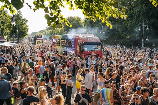 a large crowd of people watching a parade