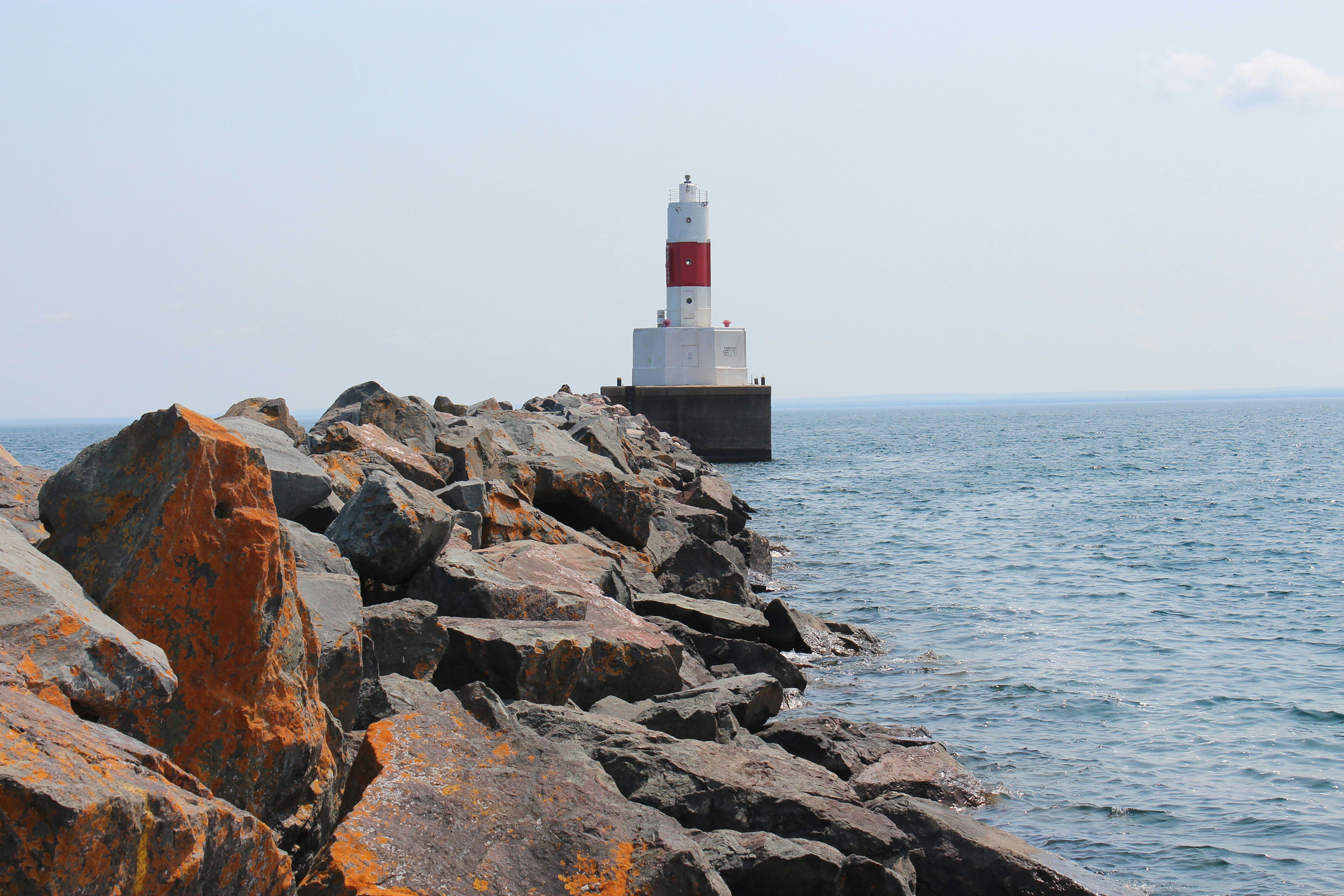 a lighthouse on a rocky shore