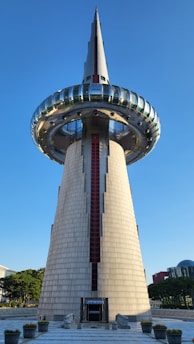a tall building with a pointed roof
