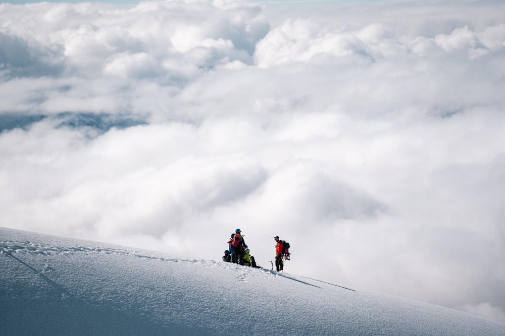 a group of people hiking up a mountain