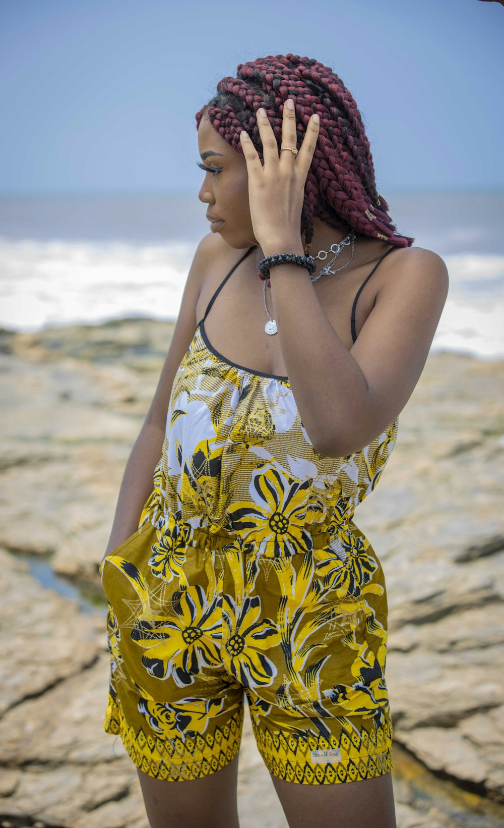 a woman in a yellow dress