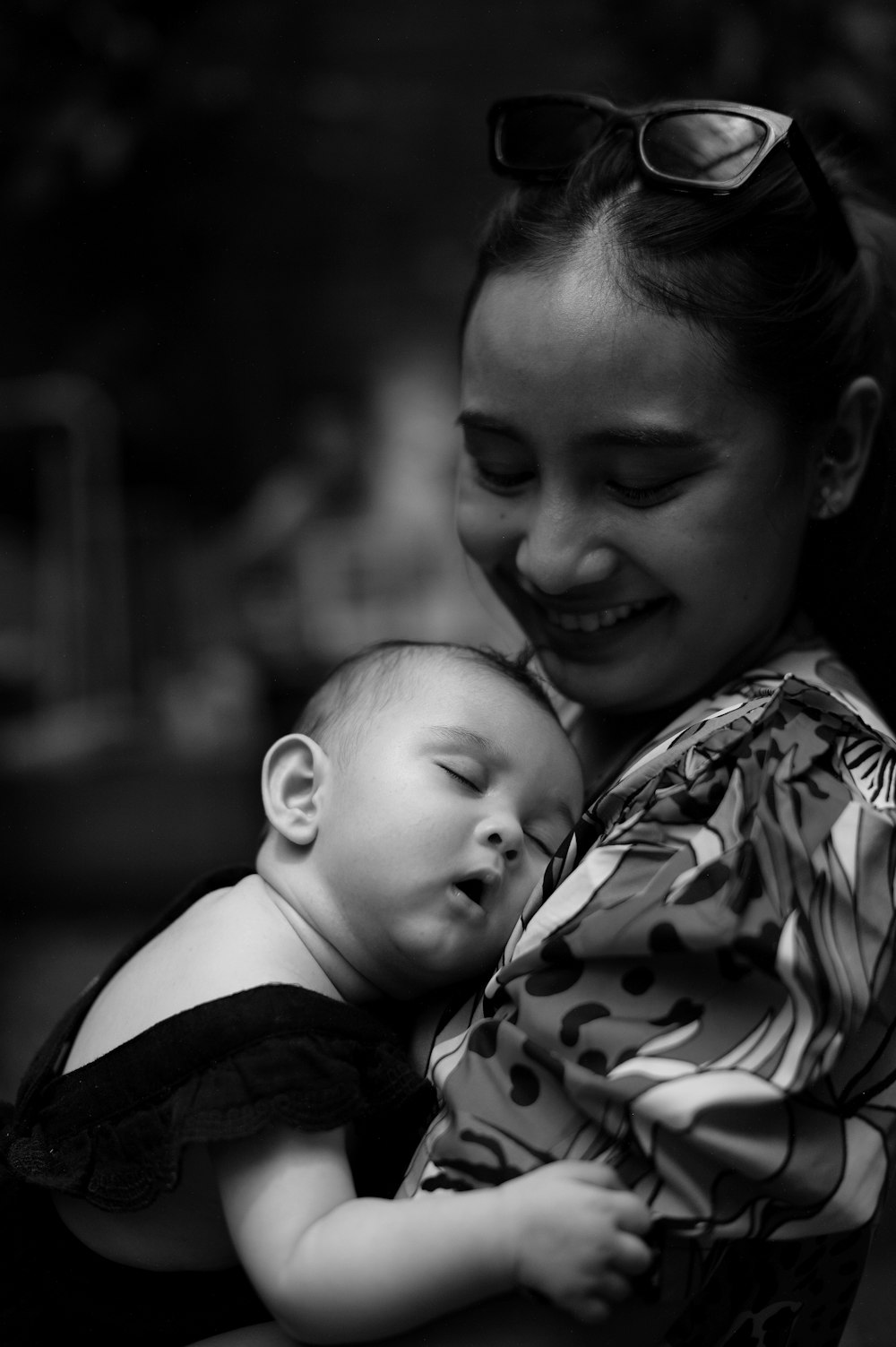 a person holding a baby