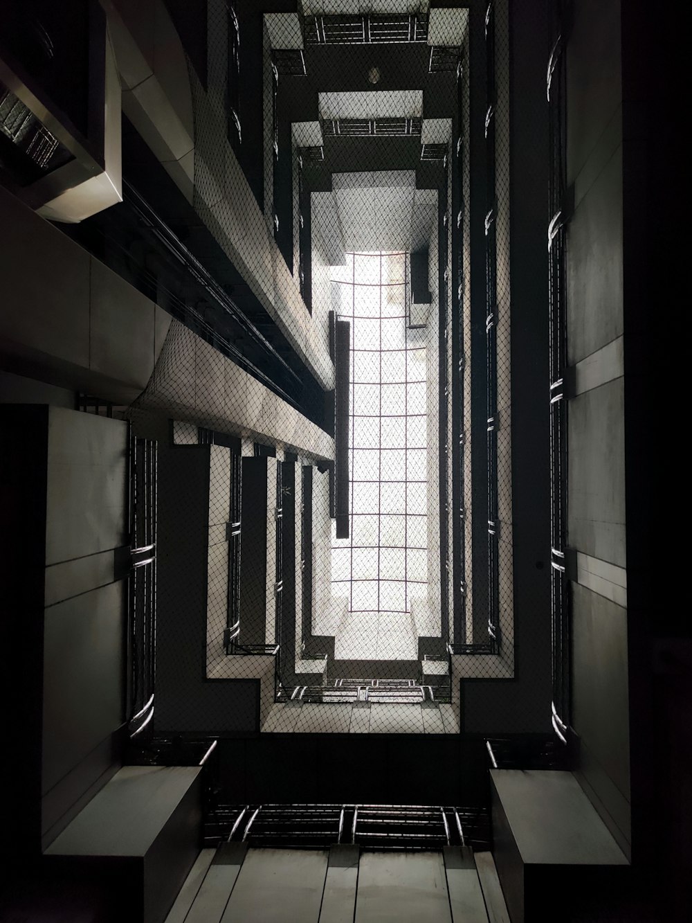 a hallway with black and white lights