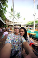 a man and woman posing for a picture