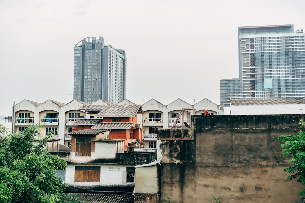 a group of buildings by a river